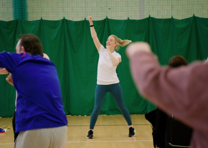 Our-Expertise-3 A woman leading an exercise class