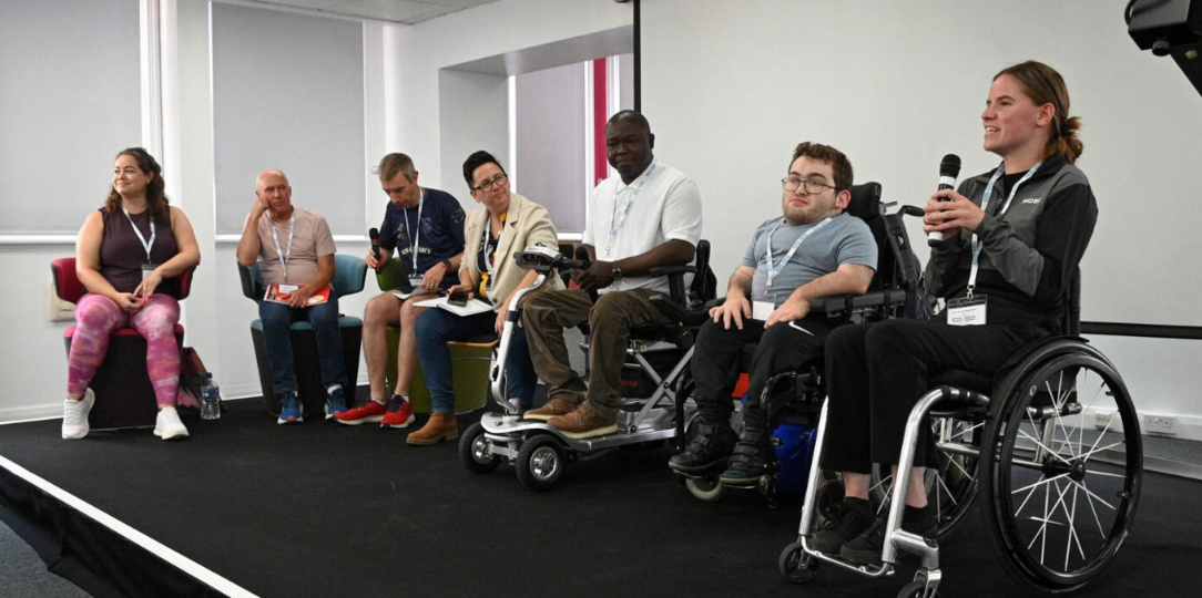 Inclusive discussion panel with speakers sharing lived experience perspectives